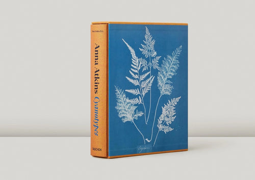 An angled view of the binding and front cover of a book titled Cyaotypes.
