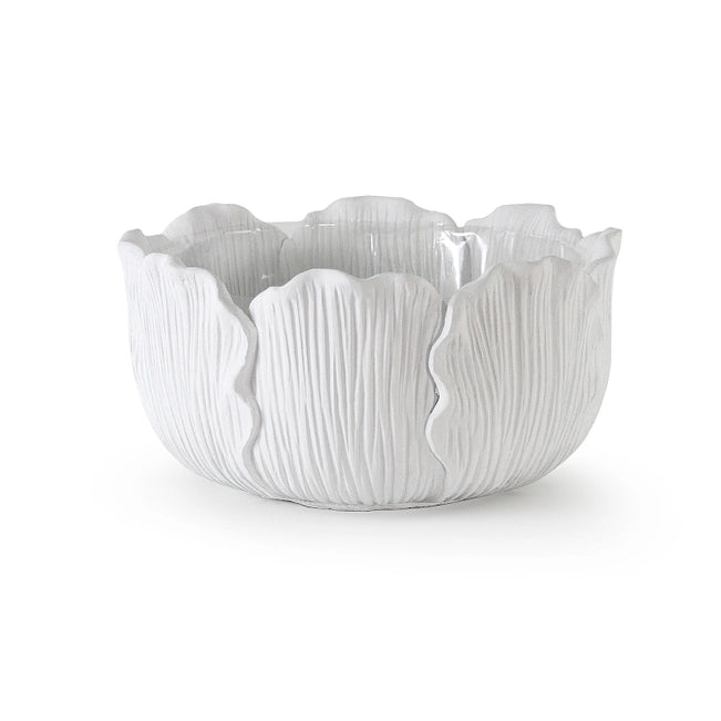 White ceramic bowl with textured surface on a white background