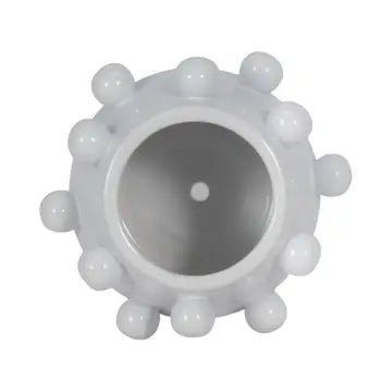White plastic gear with spherical protrusions on a white background